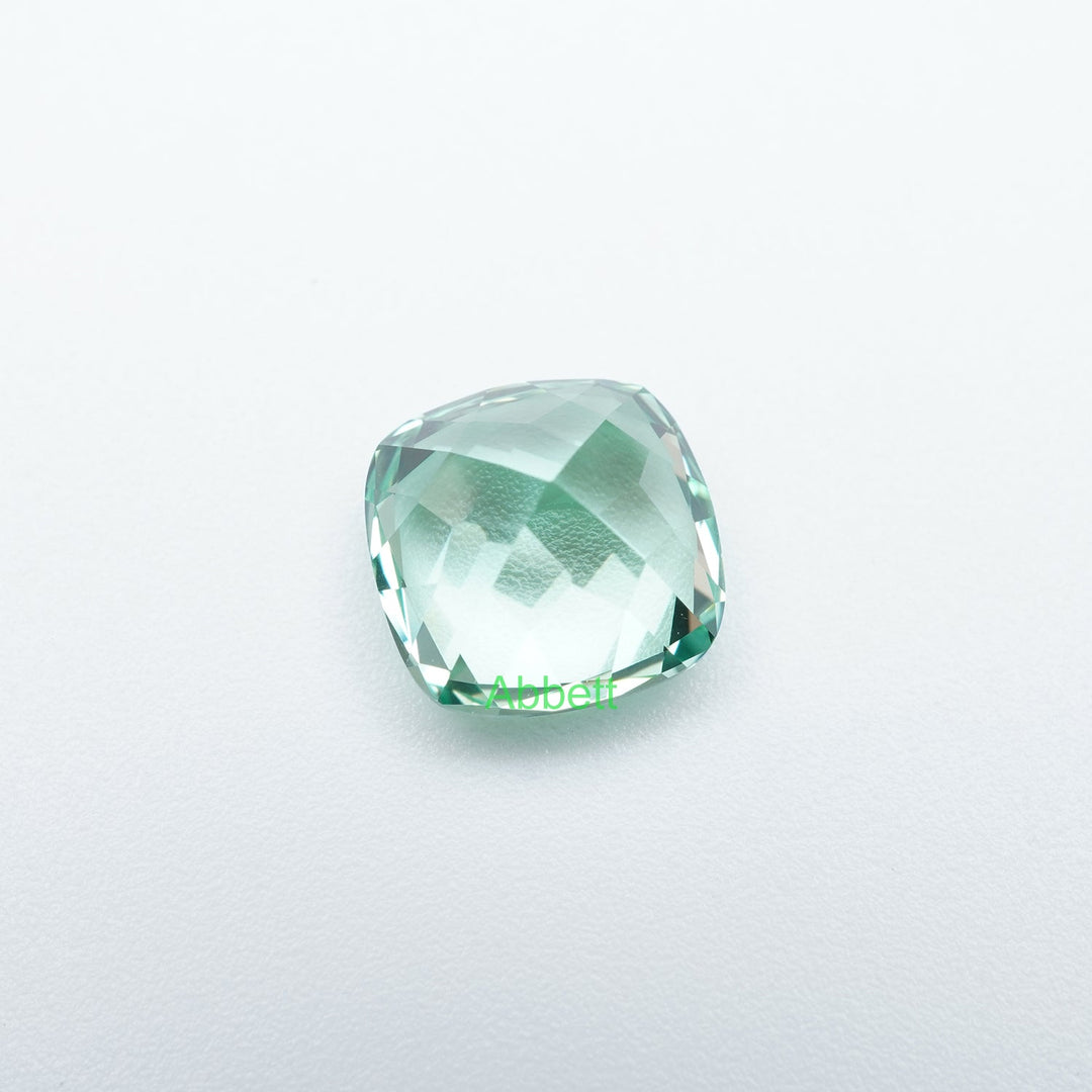 Cushion lab grown green sapphire