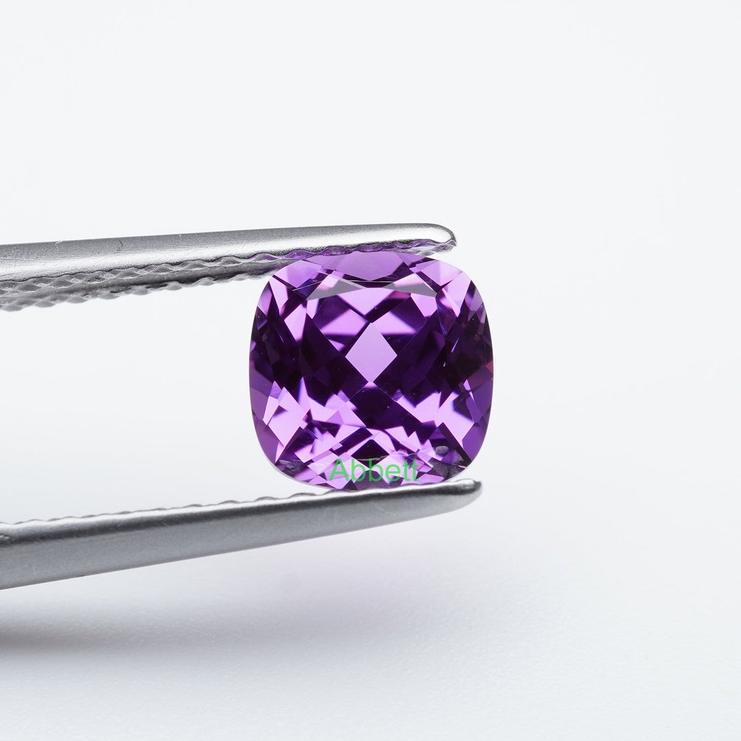Cushion lab grown purple sapphire