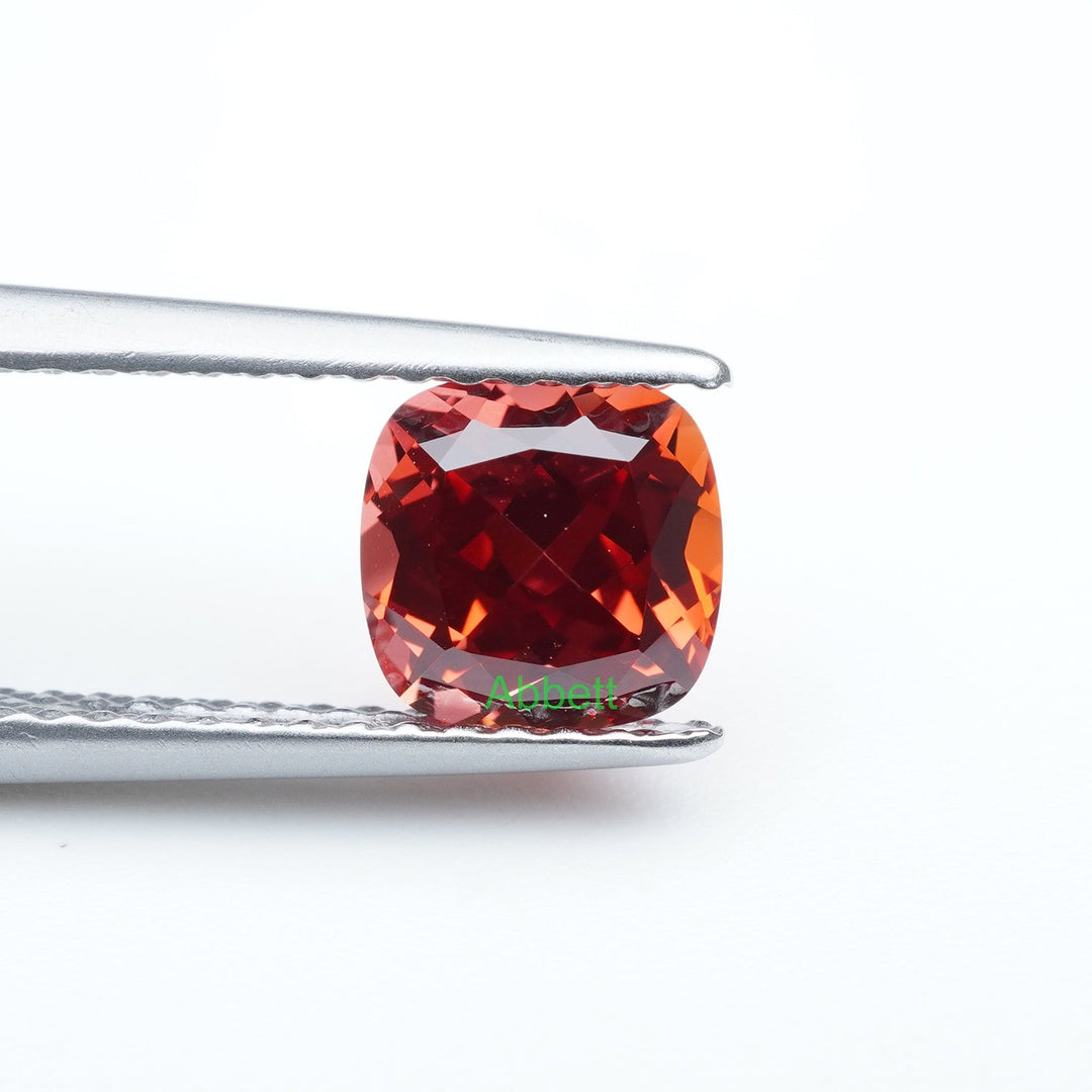 Cushion lab grown sunset coral padparadscha sapphire