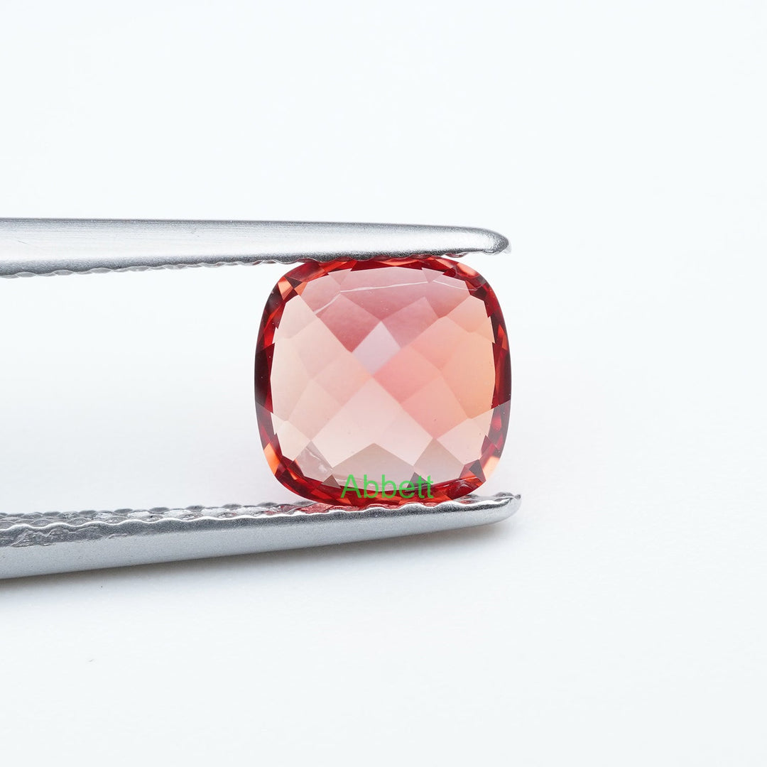 Cushion lab grown sunset coral padparadscha sapphire