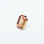 Load image into Gallery viewer, Emerald lab grown orange sapphire
