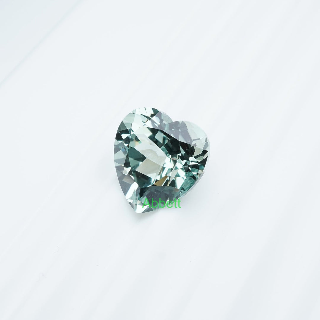Heart lab grown green sapphire