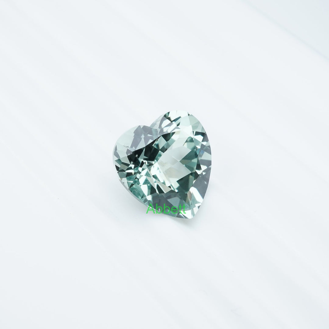 Heart lab grown green sapphire