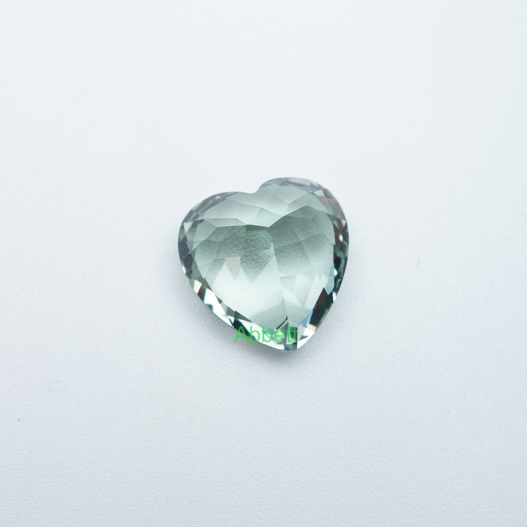 Heart lab grown green sapphire