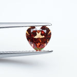 Load image into Gallery viewer, Heart lab grown orange sapphire
