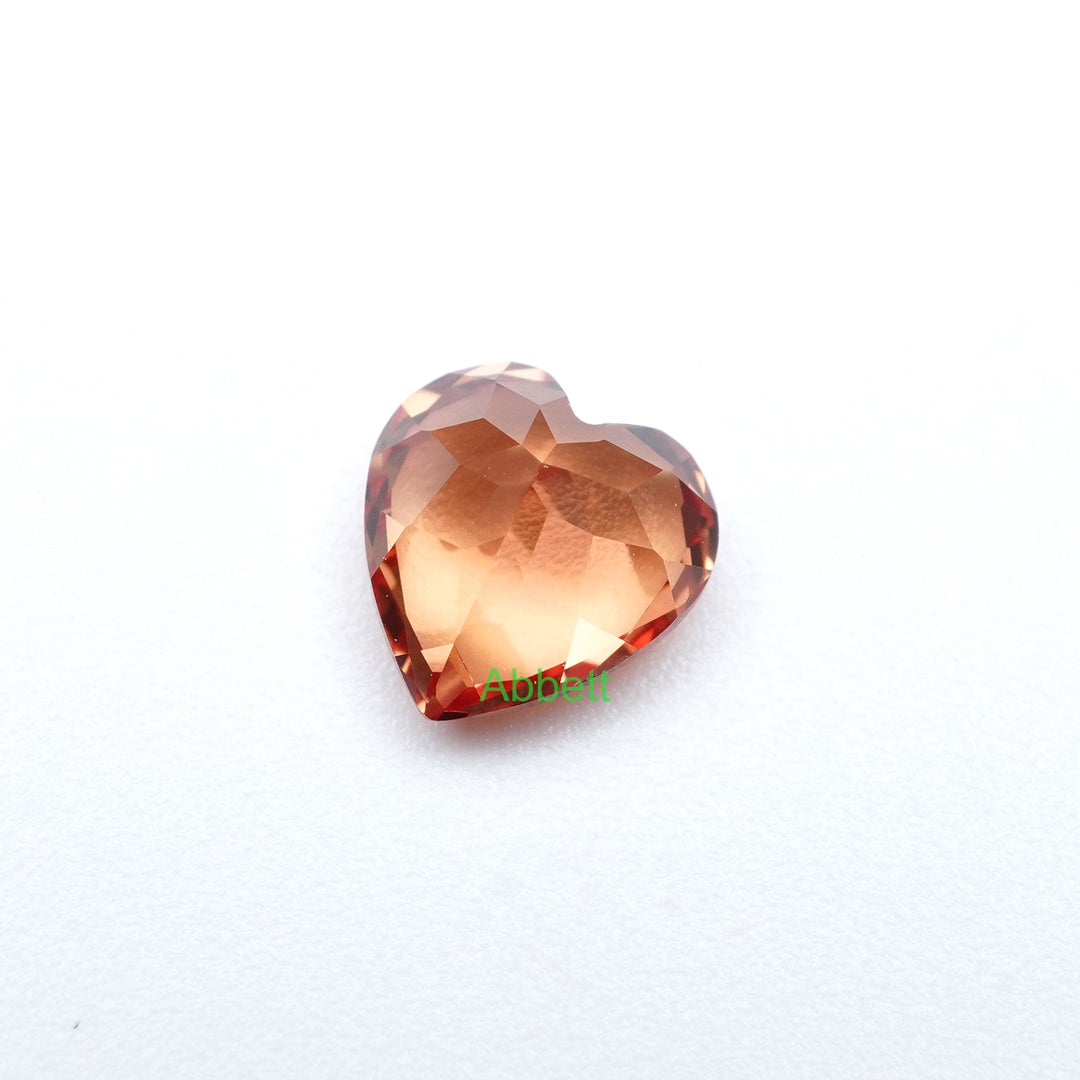 Heart lab grown orange sapphire