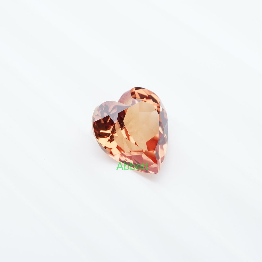 Heart lab grown orange sapphire