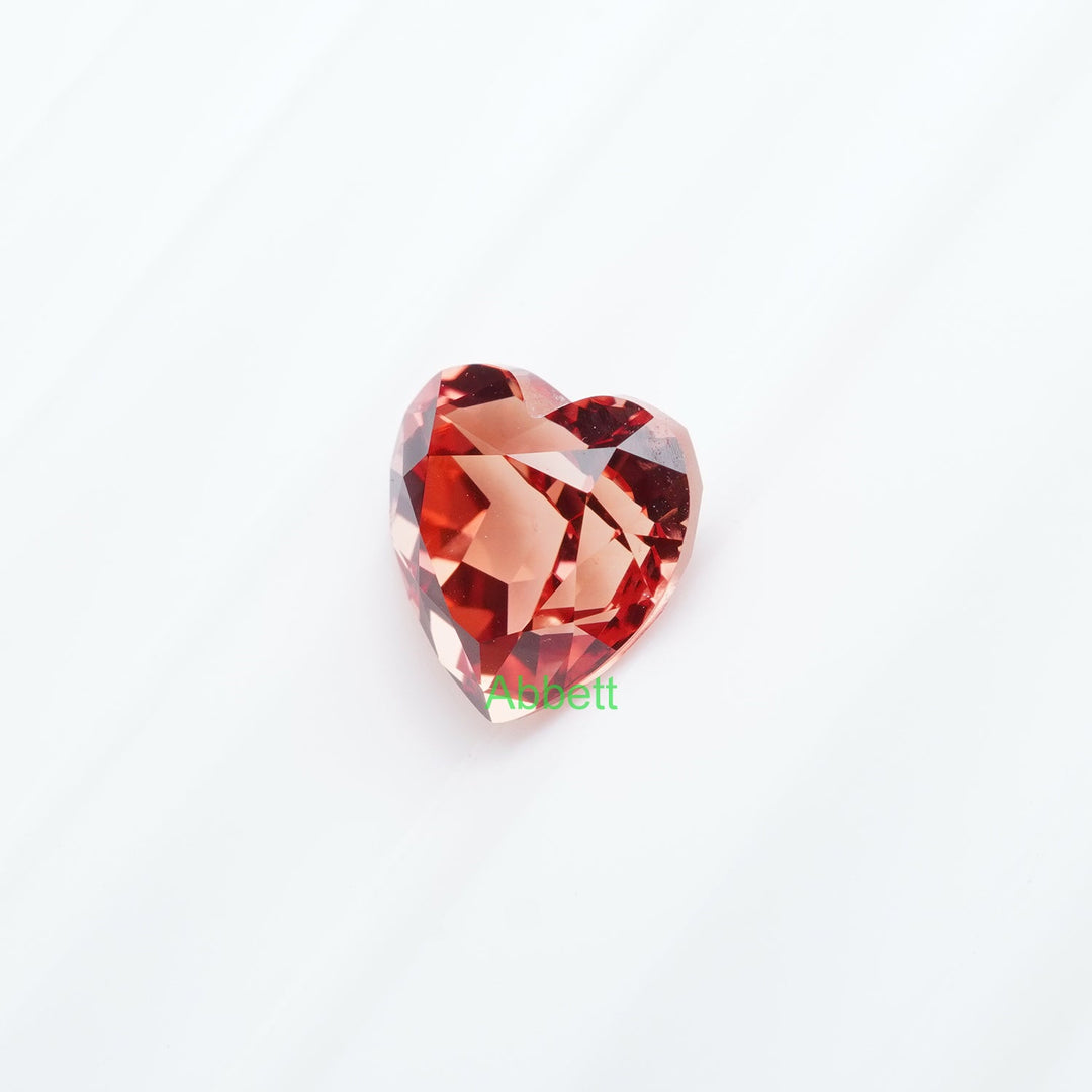 Heart lab grown sunset coral padparadscha sapphire