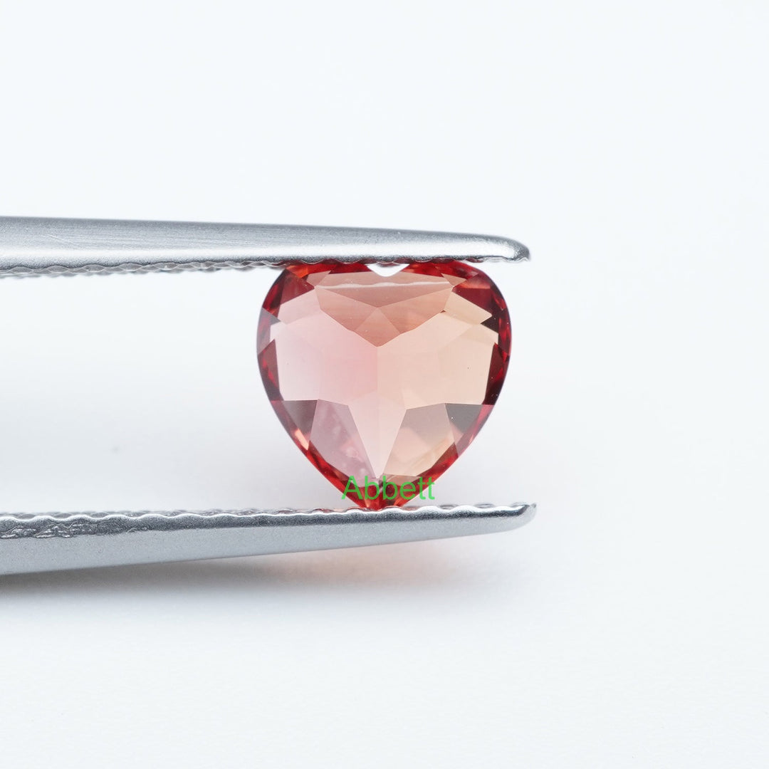 Heart lab grown sunset coral padparadscha sapphire