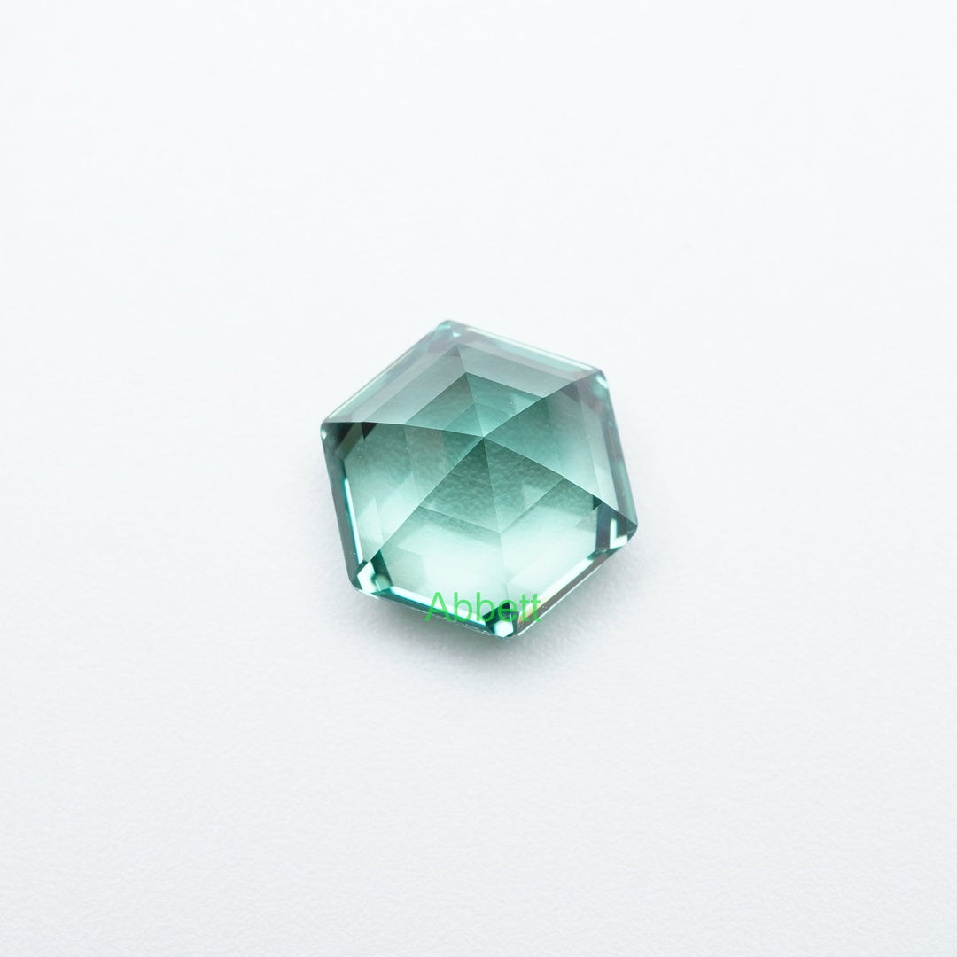 Hexagon lab grown green sapphire