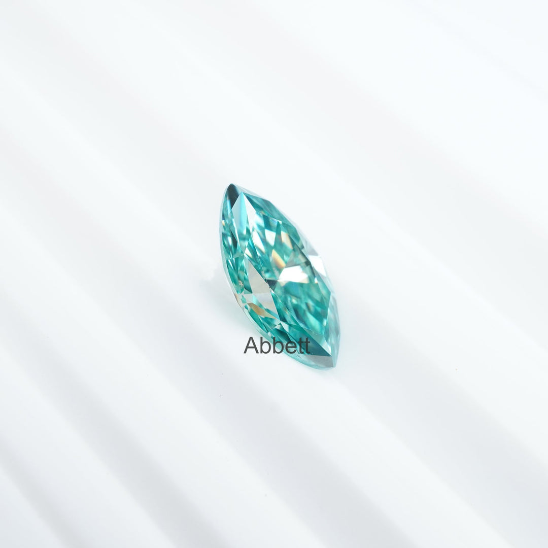 Marquise teal moissanite