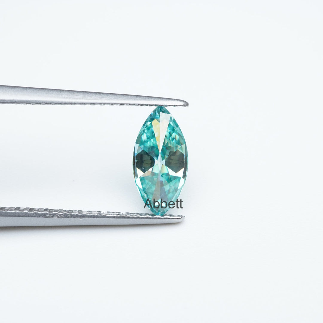 Marquise teal moissanite