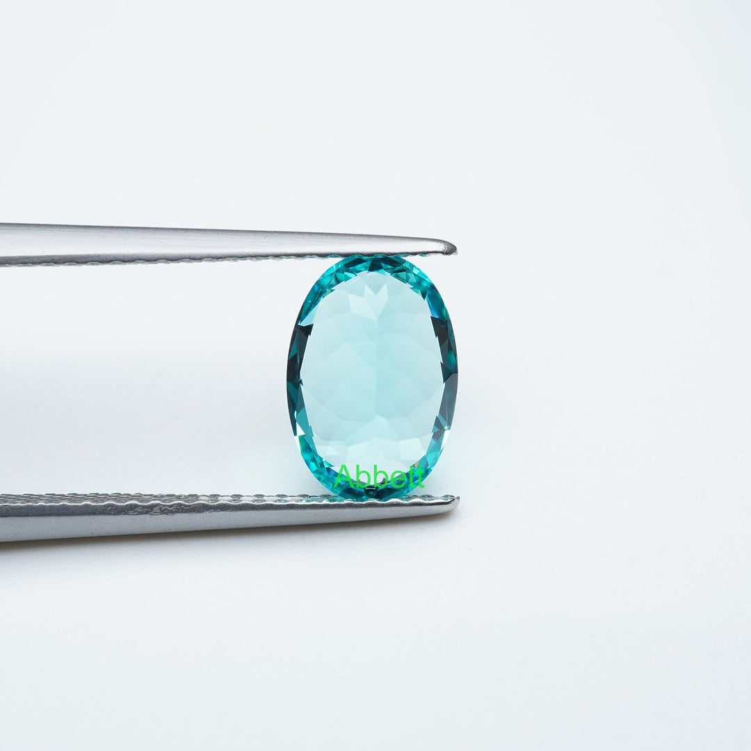 Oval lab grown Paraiba YAG