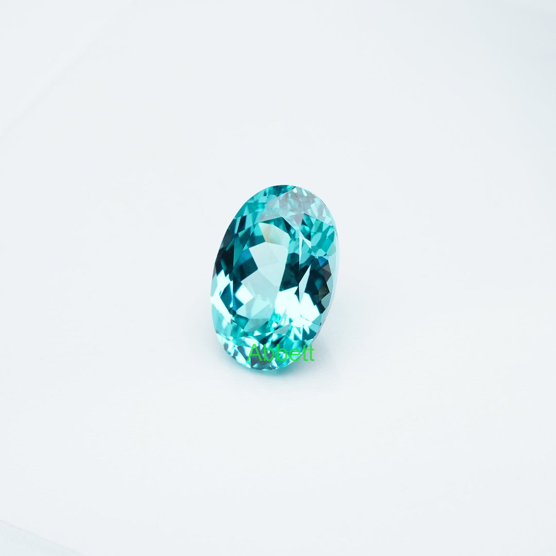 Oval lab grown Paraiba YAG