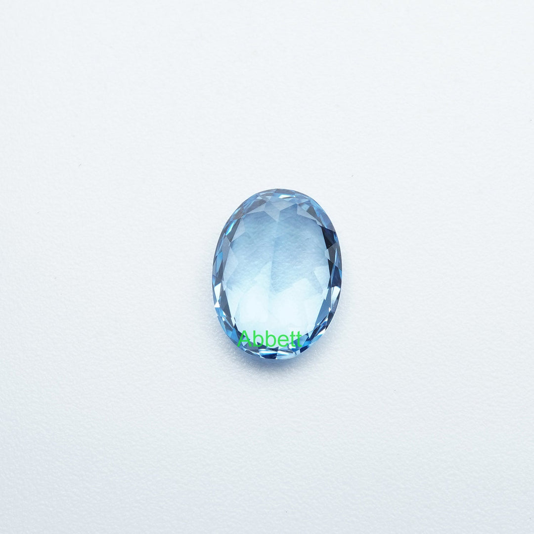Oval lab grown aqua spinel