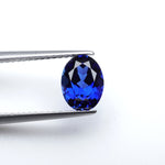 Load image into Gallery viewer, Oval lab grown blue sapphire
