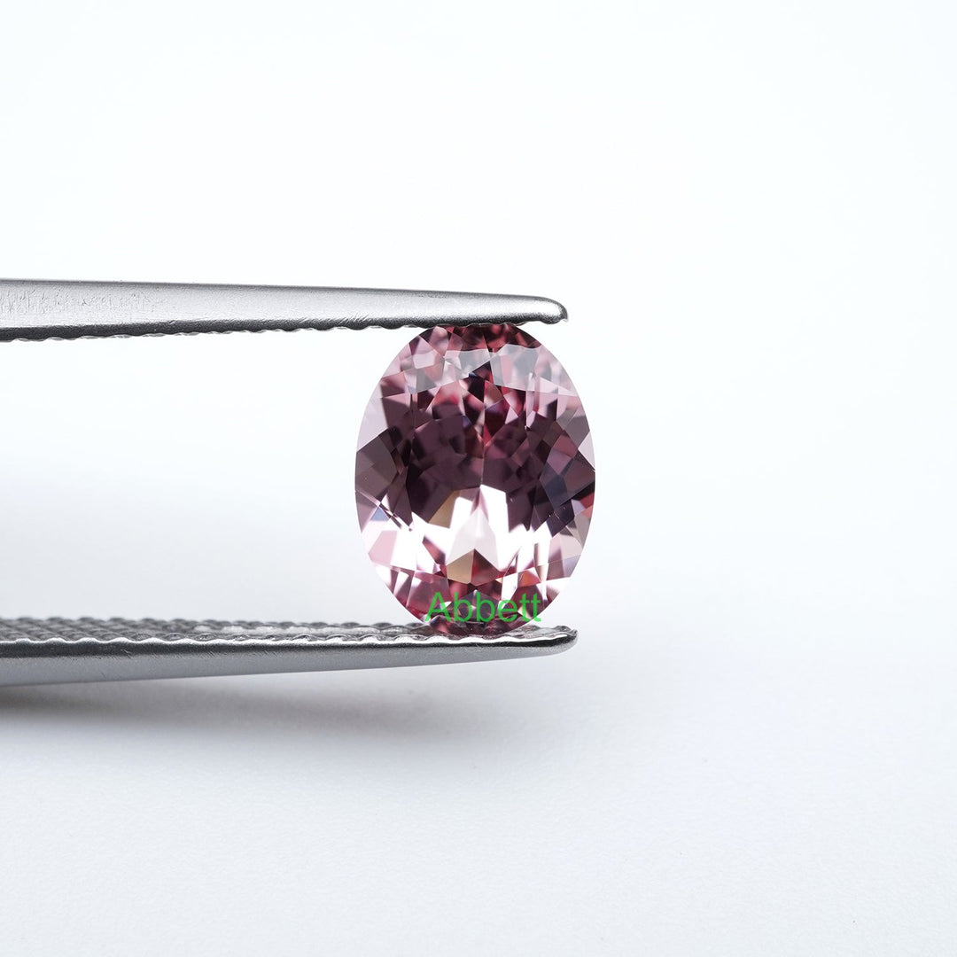 Oval lab grown champagne sapphire