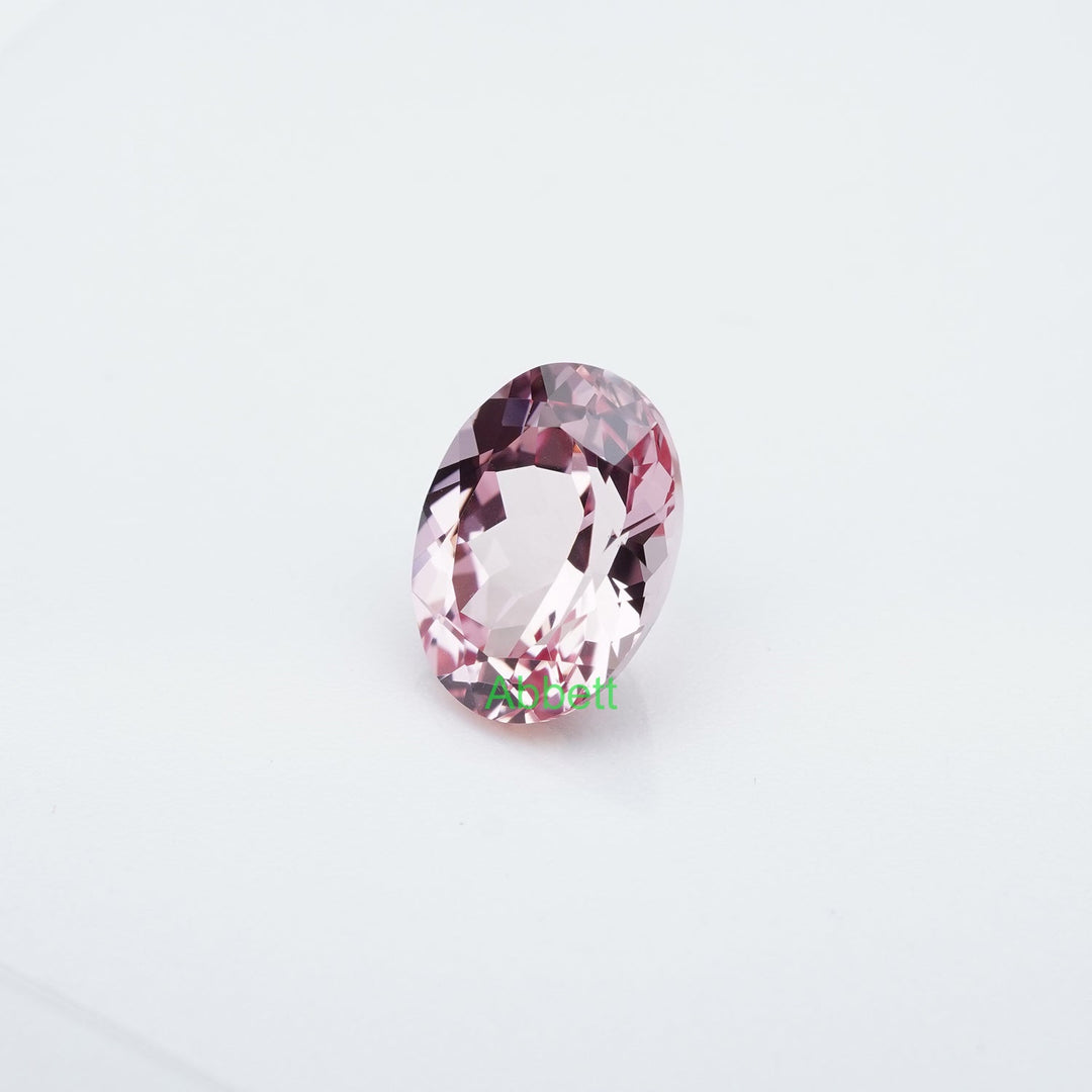 Oval lab grown champagne sapphire