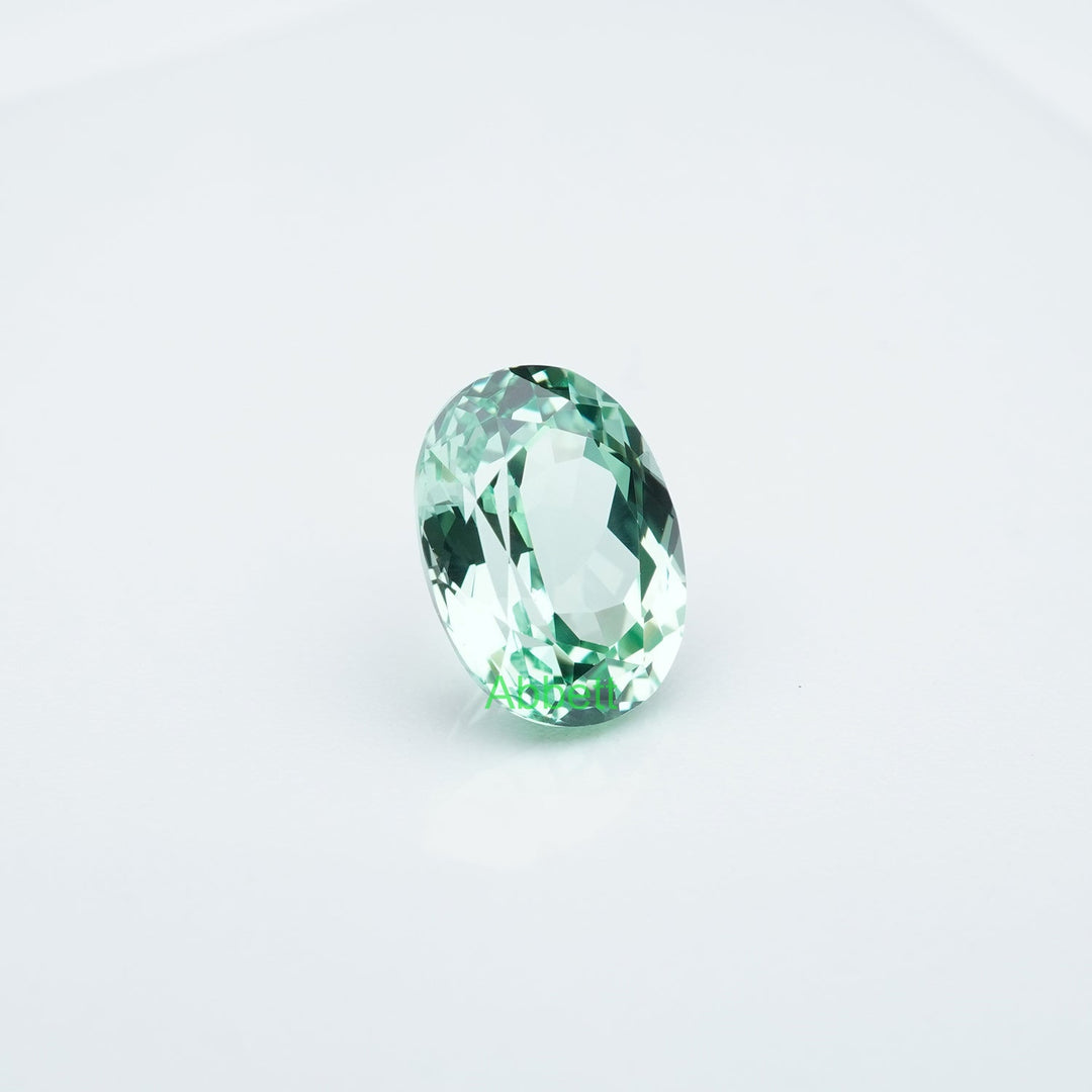 Oval lab grown green sapphire
