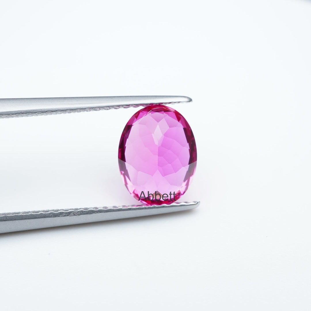 Oval lab grown hot pink sapphire