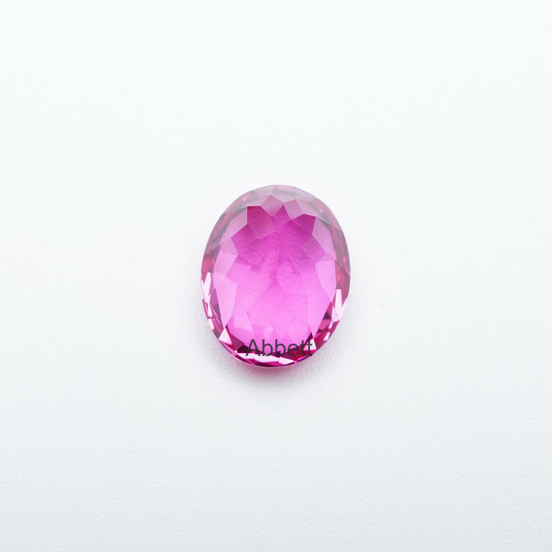 Oval lab grown hot pink sapphire