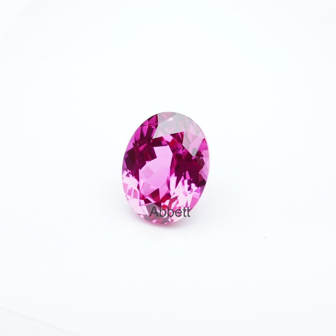 Oval lab grown hot pink sapphire