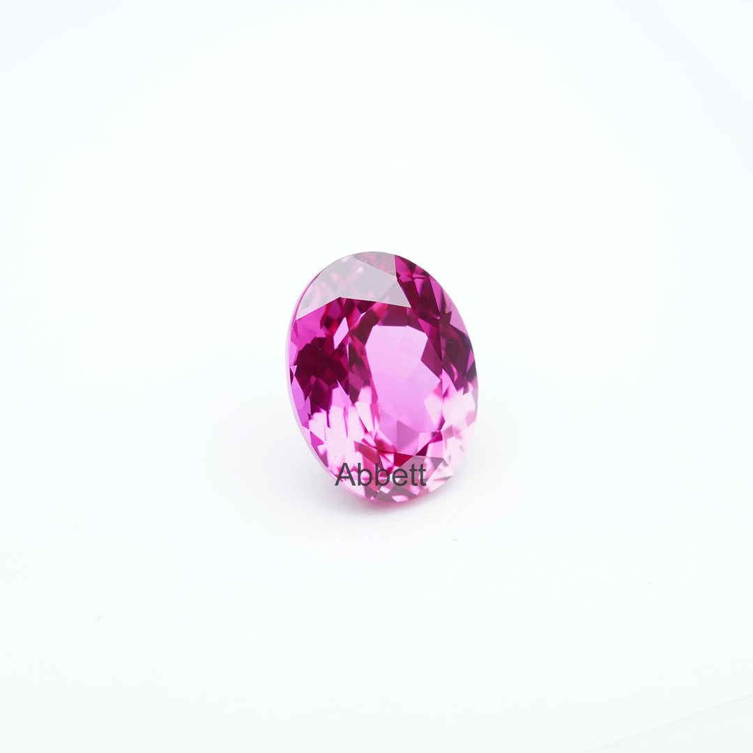 Oval lab grown hot pink sapphire