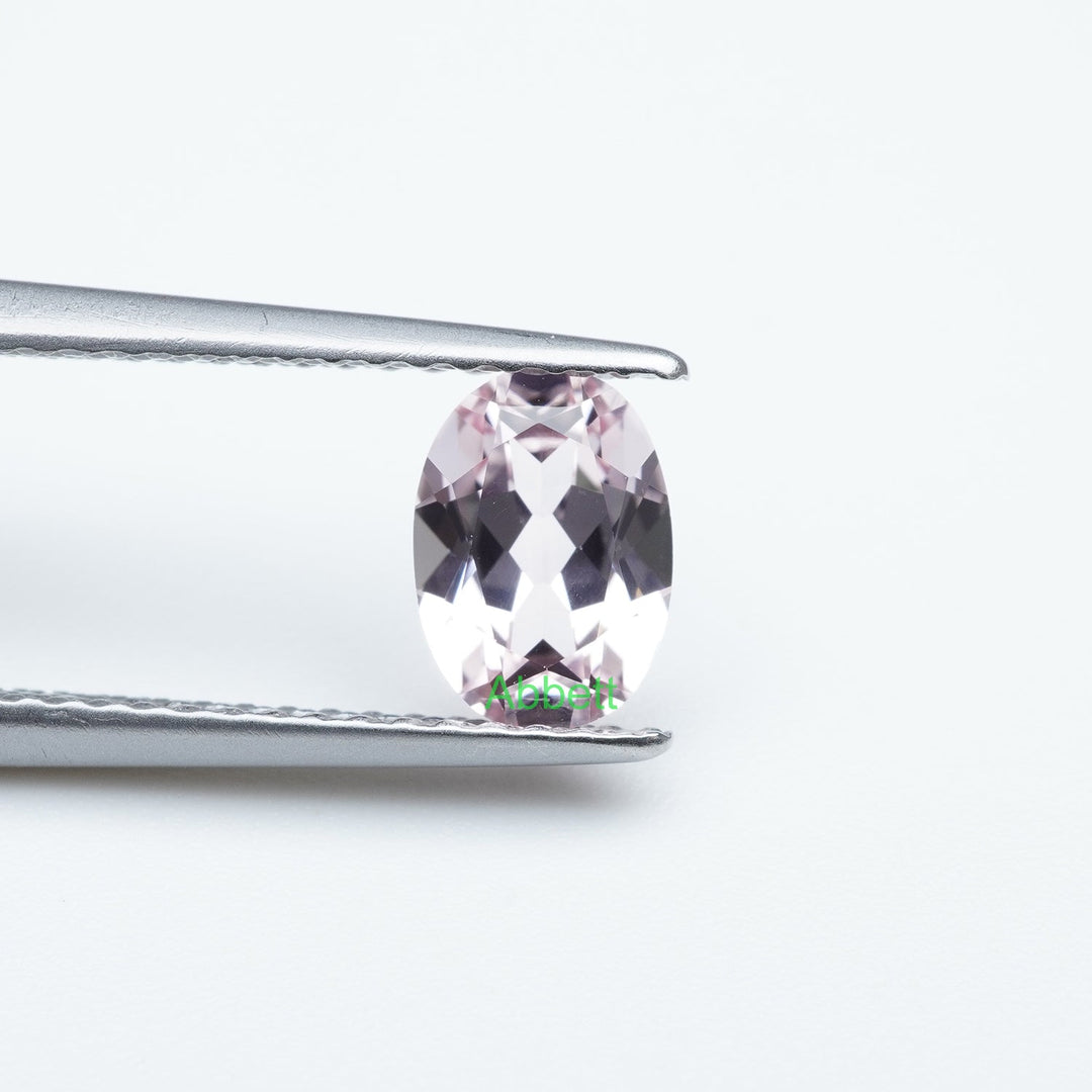 Oval lab grown light pink sapphire