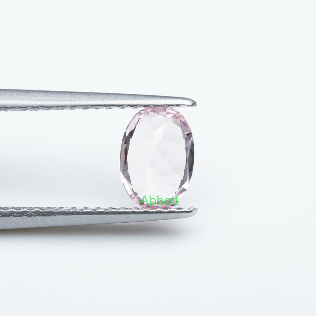 Oval lab grown light pink sapphire