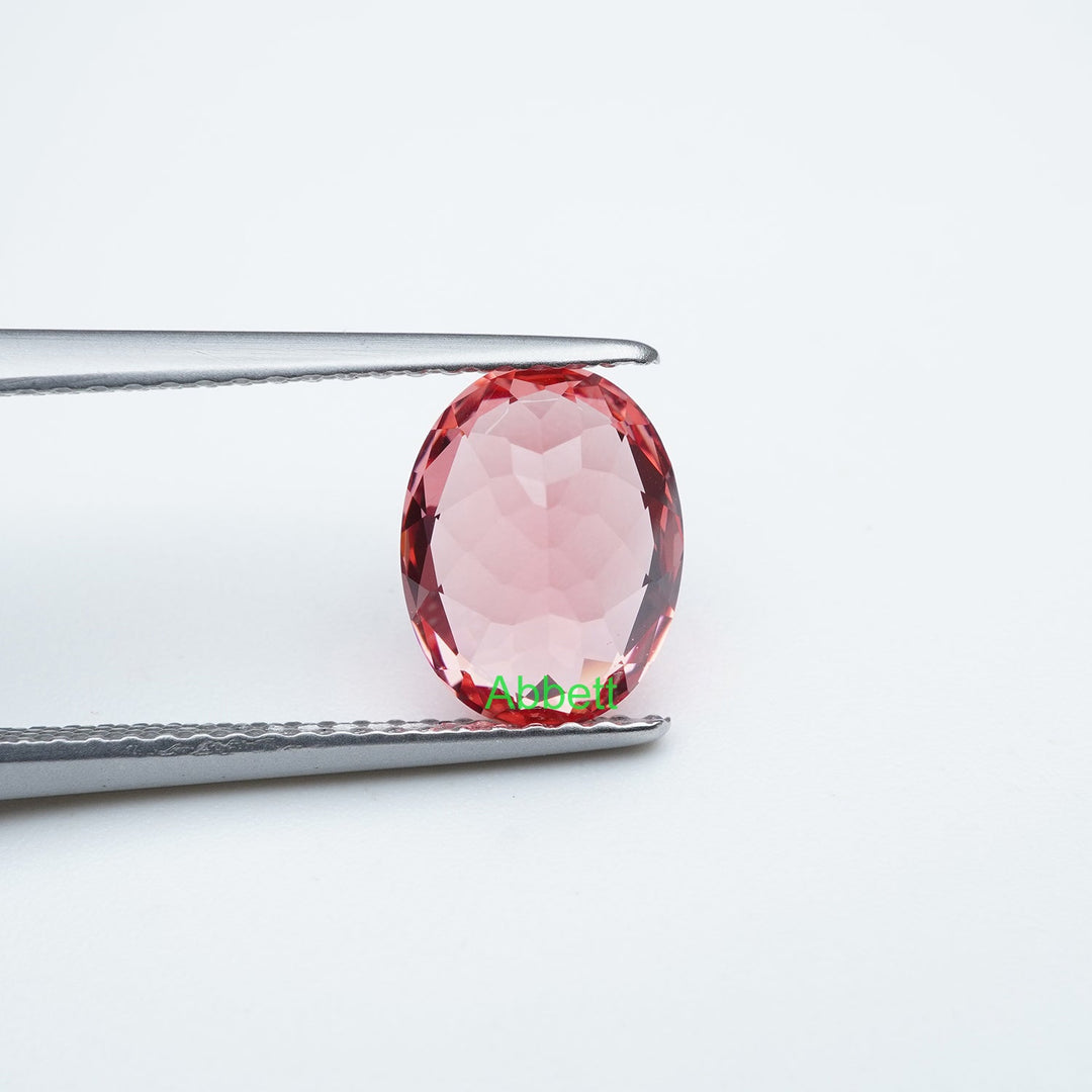 Oval lab grown padparadscha sapphire