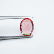 Oval lab grown padparadscha sapphire