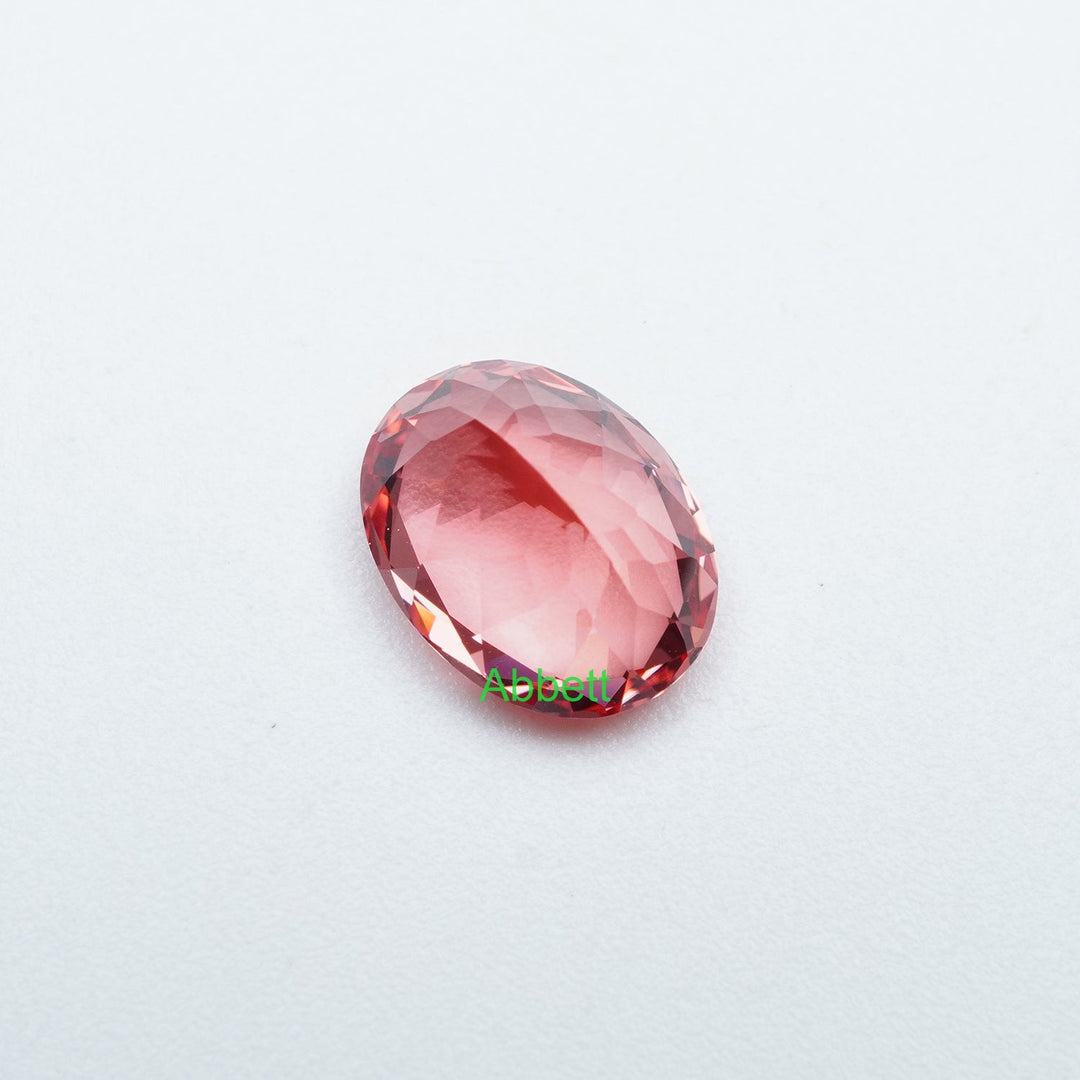 Oval lab grown padparadscha sapphire