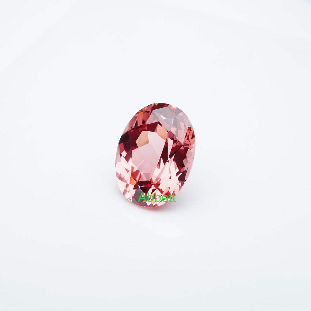 Oval lab grown padparadscha sapphire