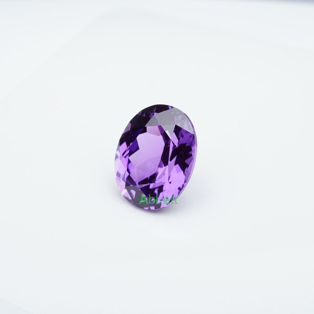 Oval lab grown purple sapphire
