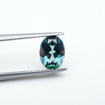 Load image into Gallery viewer, Oval lab grown teal sapphire
