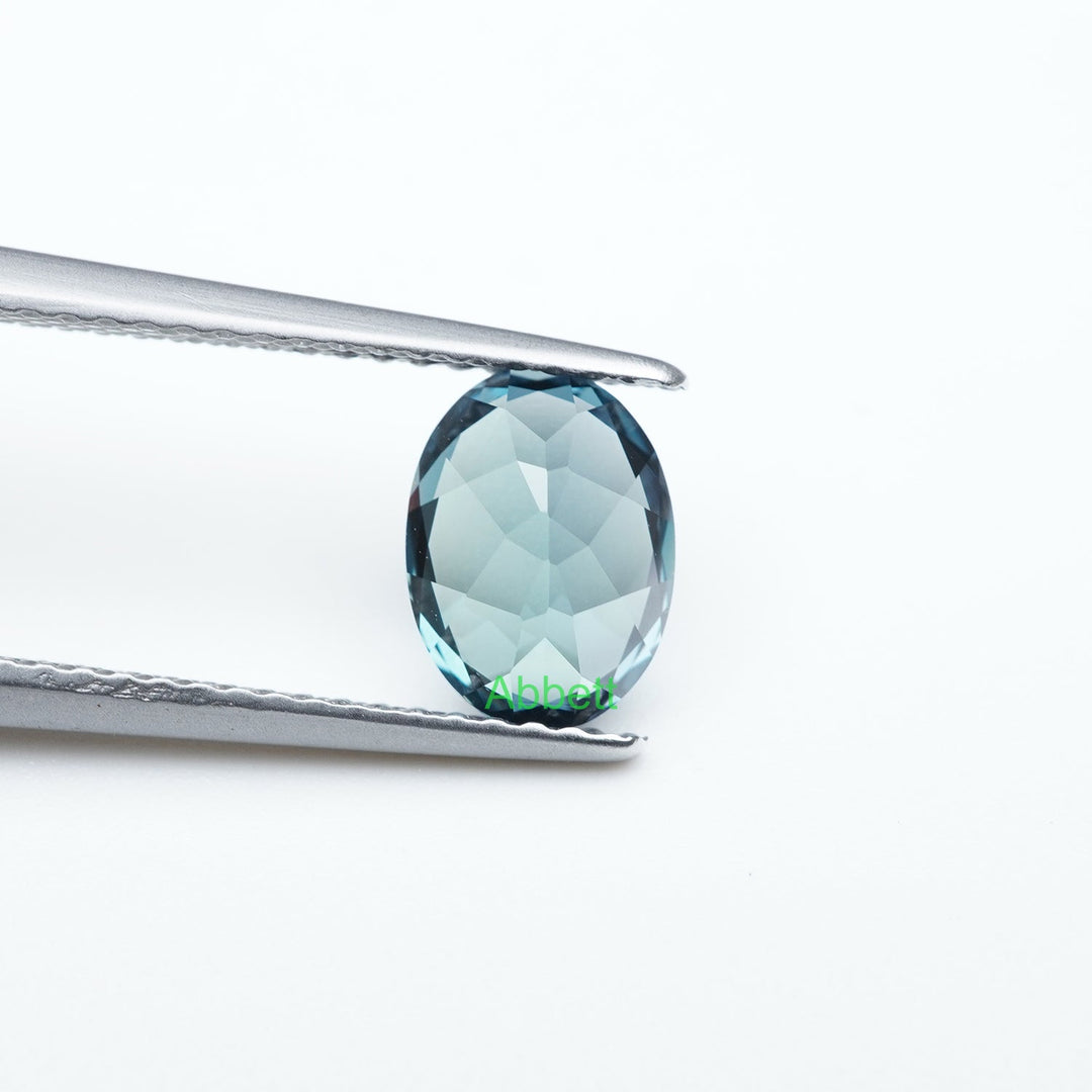 Oval lab grown teal sapphire