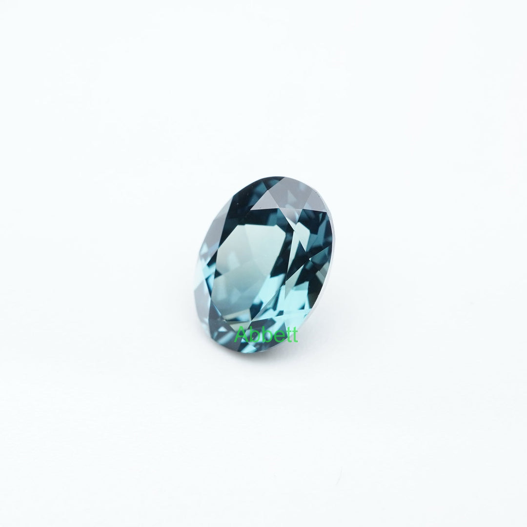 Oval lab grown teal sapphire