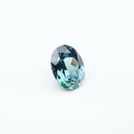Load image into Gallery viewer, Oval lab grown teal sapphire
