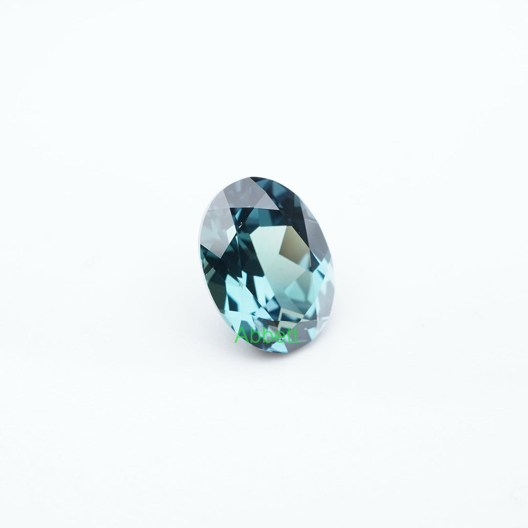 Oval lab grown teal sapphire