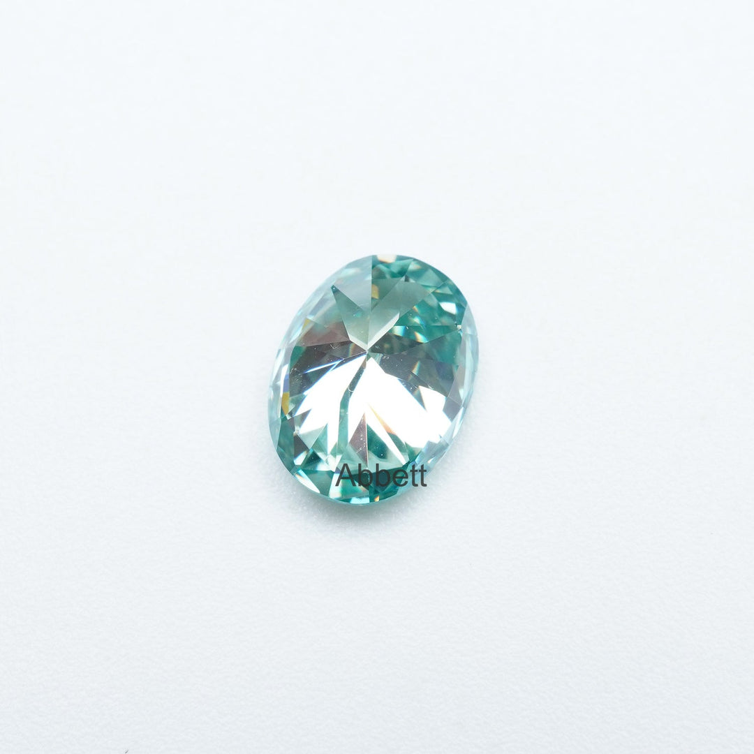 Oval teal moissanite