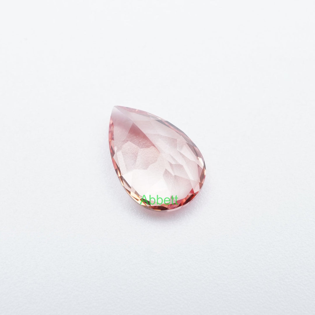 Pear lab grown champagne sapphire