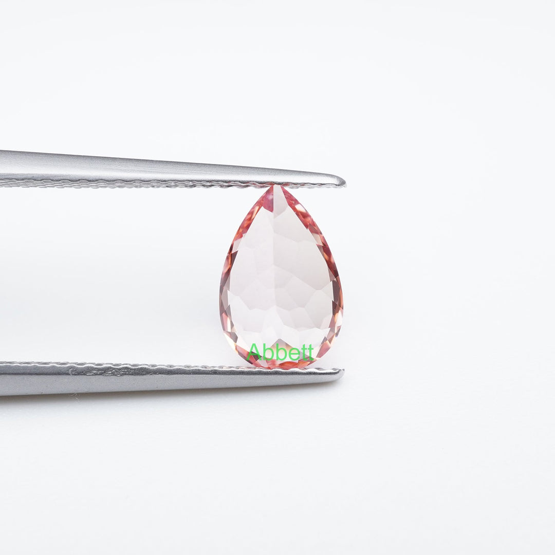 Pear lab grown champagne sapphire