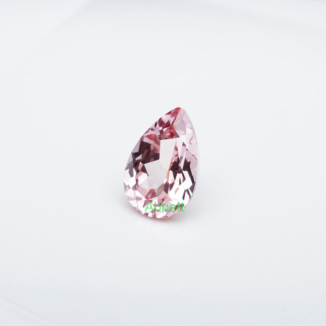 Pear lab grown champagne sapphire