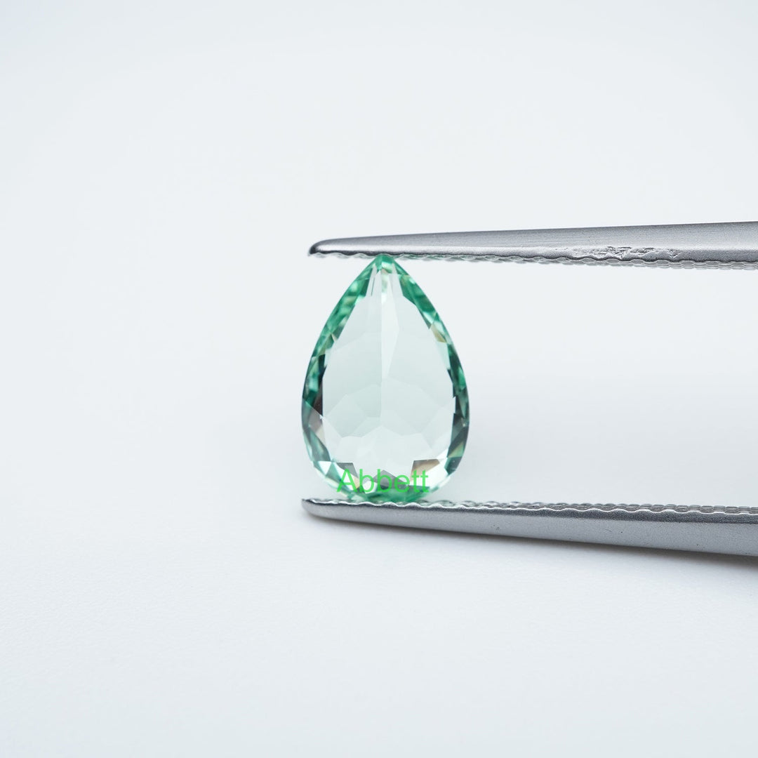 Pear lab grown green sapphire