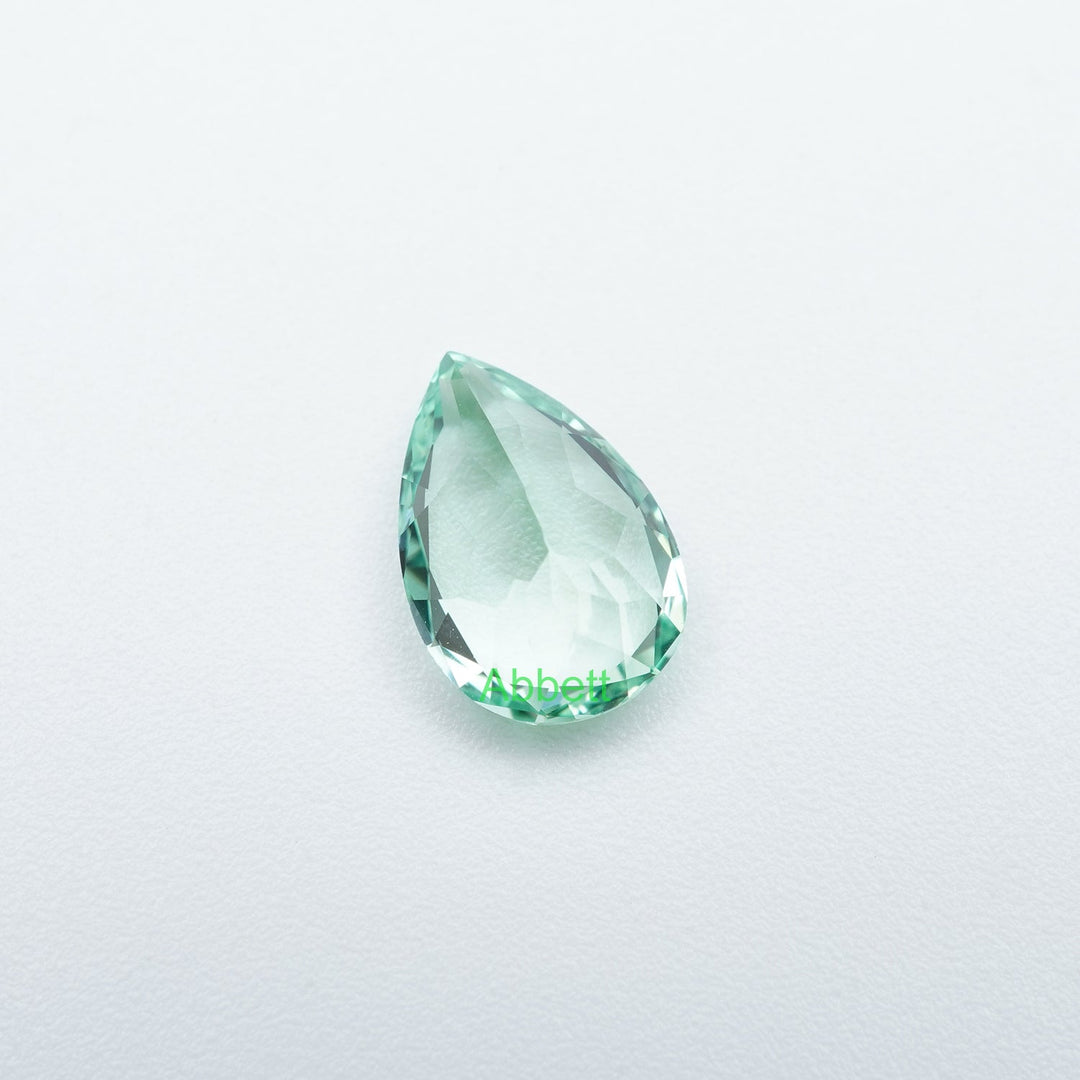 Pear lab grown green sapphire