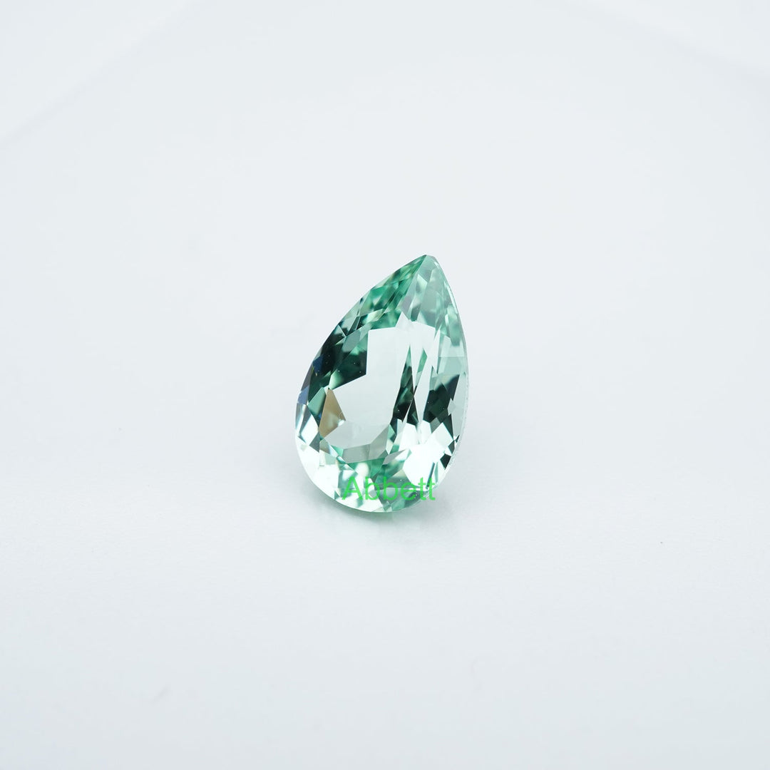 Pear lab grown green sapphire
