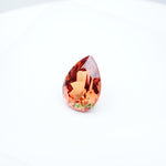 Load image into Gallery viewer, Pear lab grown orange sapphire
