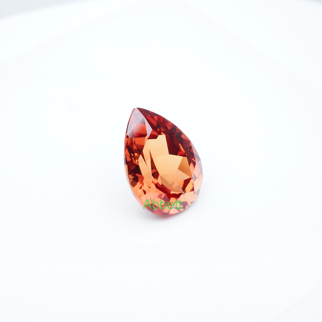 Pear lab grown orange sapphire