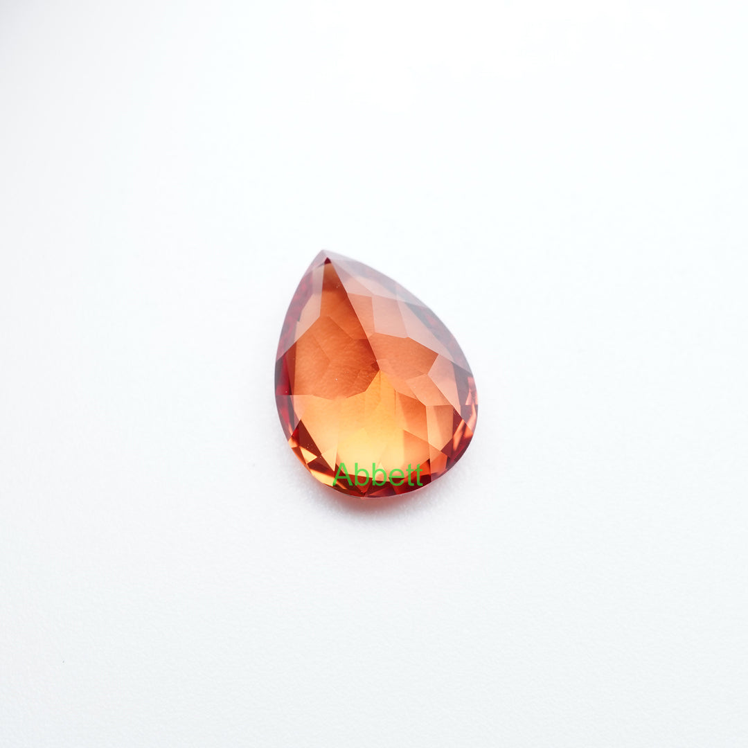 Pear lab grown orange sapphire