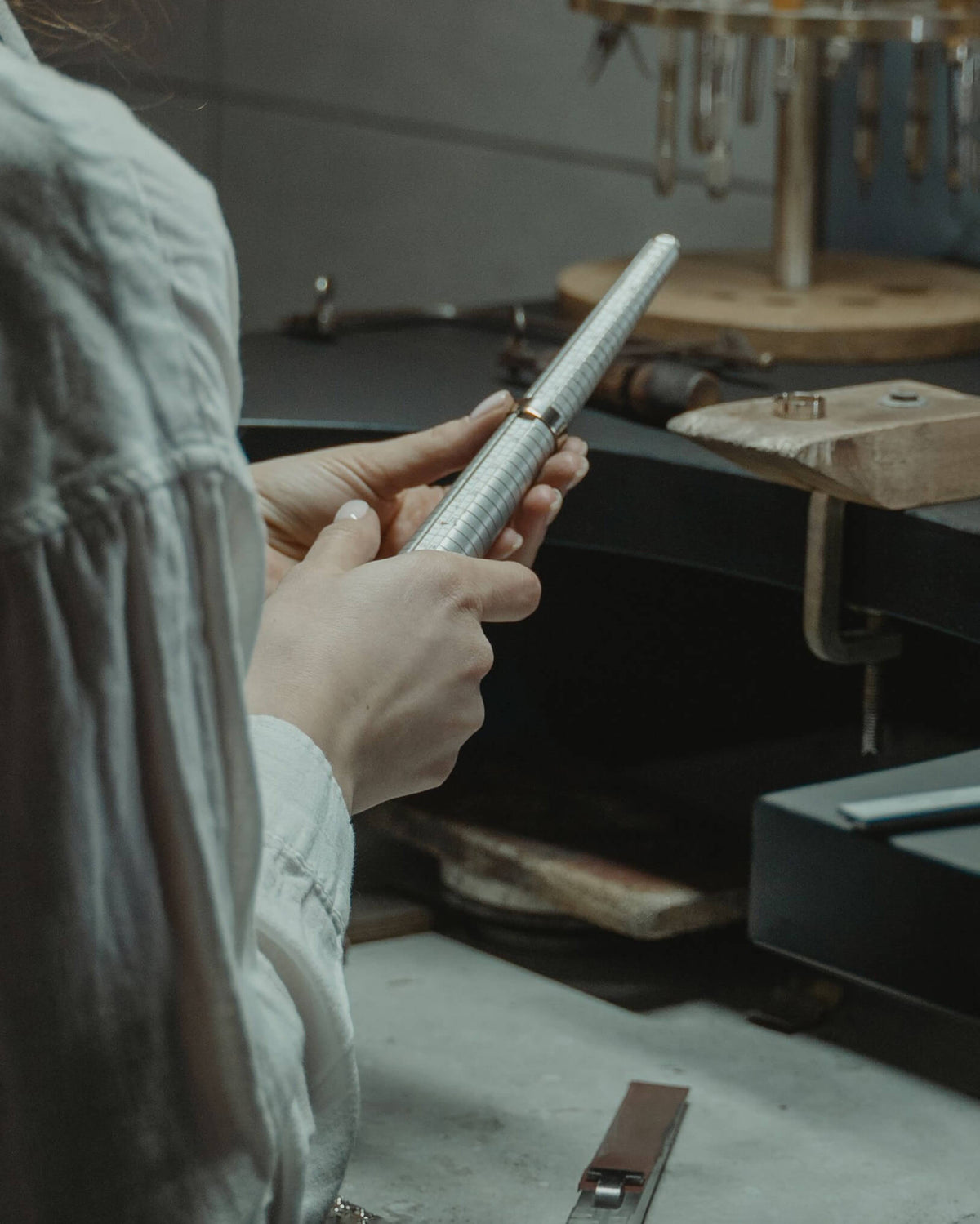 Jeweller professionally measuring an Abbett ring